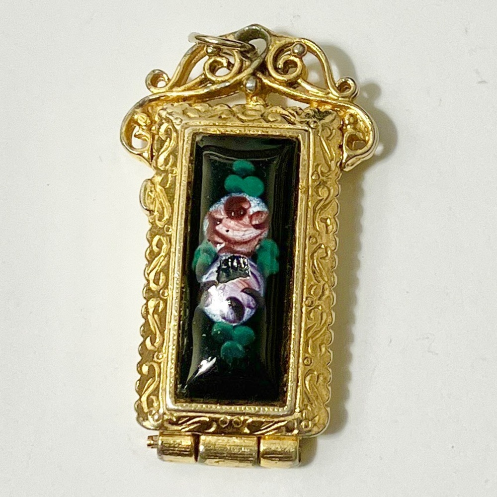 pendant with small chip